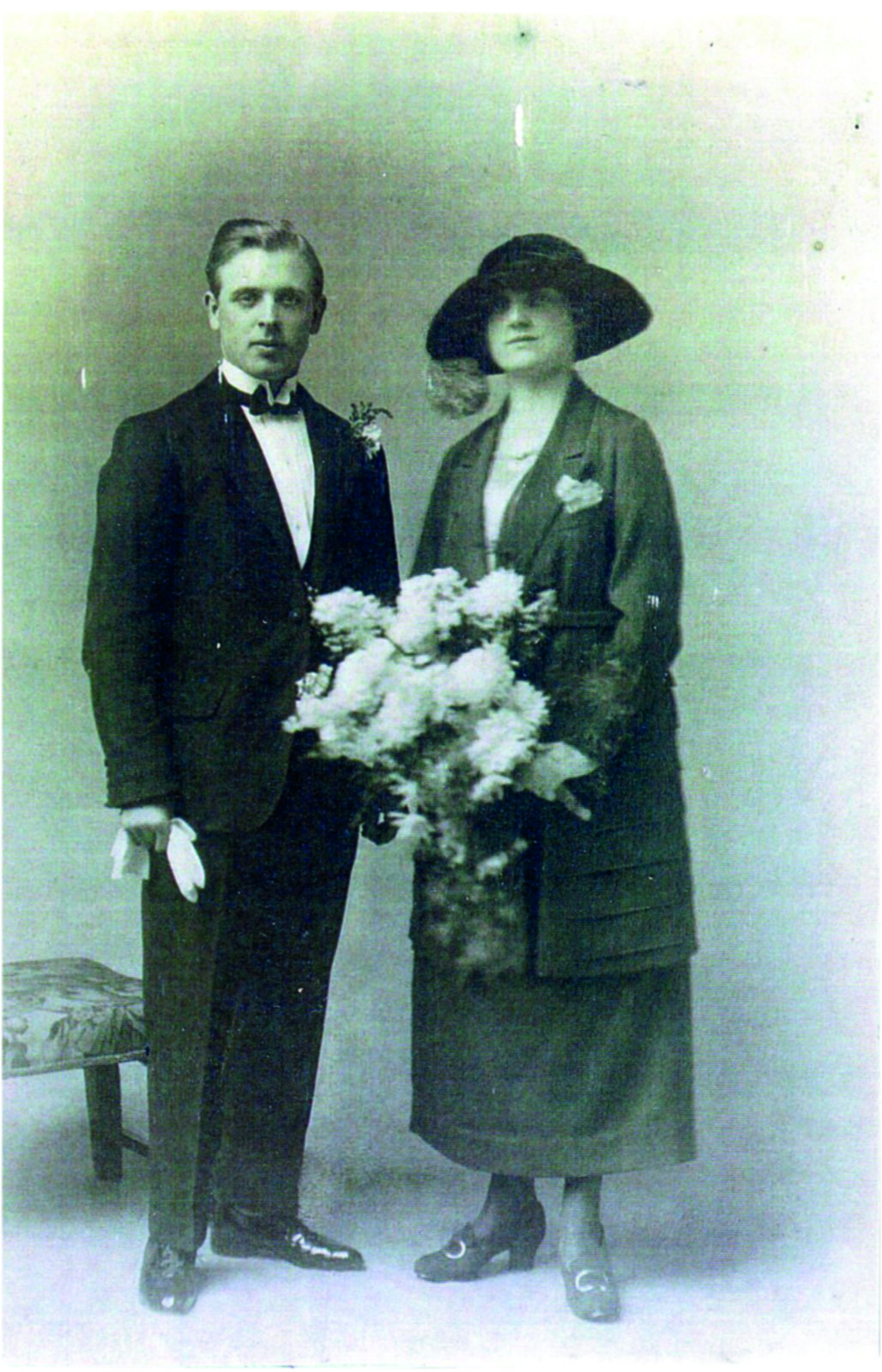Black and white photograph of a man and woman getting married