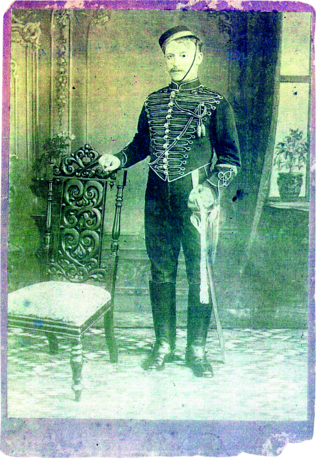 Black and white photograph of a man in an old-fashioned military uniform