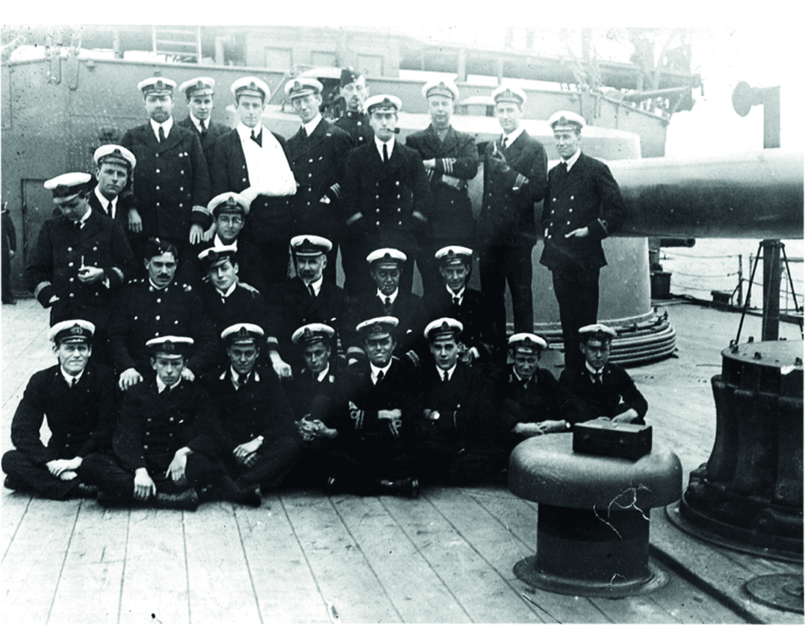 Black and white photograph of the crew of a navy ship